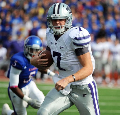 Collin Klein throws for a career-high 195 yards and runs for another 92 yards. He ends the game with five total touchdowns.  (US Presswire)