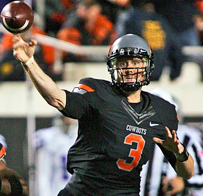 Brandon Weeden completes 36 of 46 passes for 502 yards, four touchdowns and two interceptions. (Getty Images)