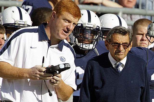 Mike McQueary (left) reportedly told Paterno about the locker room incident involving Sandusky in 2002. (AP)