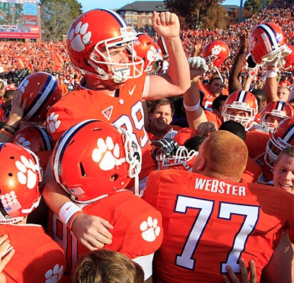 Chandler Catanzaro gets a lift as Clemson celebrates clinching its second ACC title-game berth in three seasons.  (AP)