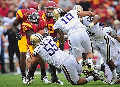 Curtis McNeal runs for a career-high 148 yards, including a 79-yard TD sprint against Washington. (US Presswire)