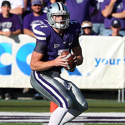 Collin Klein enjoys a six-touchdown day, including the game winner on a QB sneak in the fourth overtime. (US Presswire)