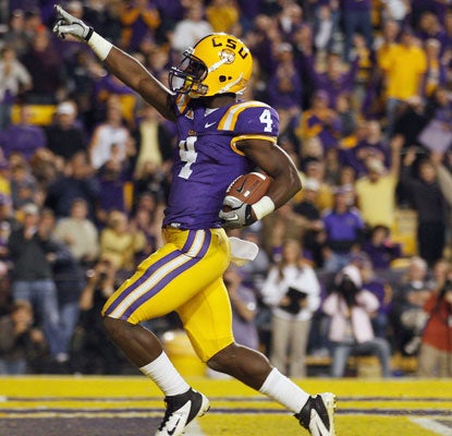 Alfred Blue scores one of his two touchdowns as LSU dispatches overmatched Western Kentucky.  (Getty Images)