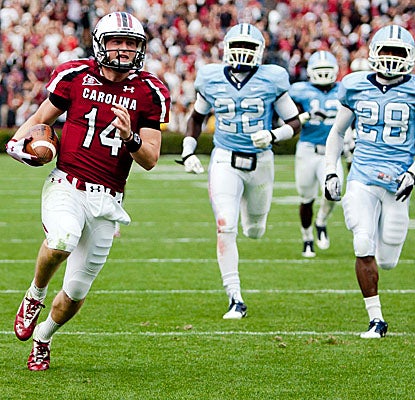 QB Connor Shaw rushes for a 60-yard touchdown to add to his three TD passes as South Carolina puts away Citadel. (US Presswire)
