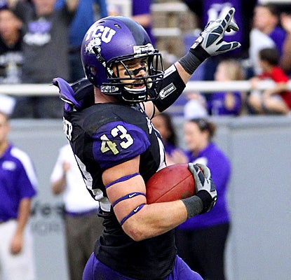 TCU's Tank Carder celebrates after running back an interception for a touchdown vs. Colorado State. (US Presswire)