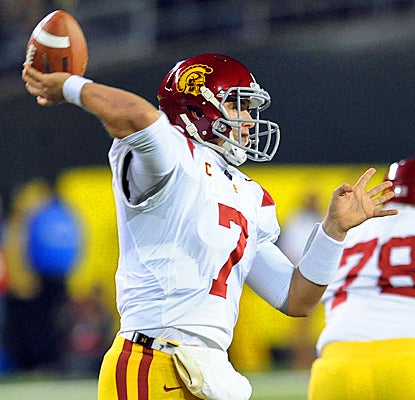 USC's Matt Barkley puts on a show against Oregon, completing 26 of 34 passes for 323 yards and four touchdowns. (Getty Images)
