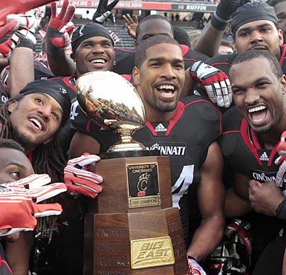 The Bearcats celebrate after clinching a share of Cincinnati's third Big East title in four seasons.  (AP)