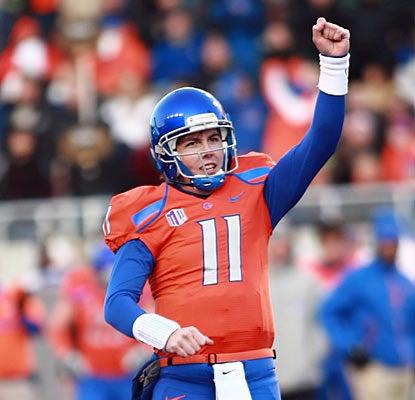Boise State's Kellen Moore celebrates one of his three TDs in the final home game of his college career. (US Presswire)