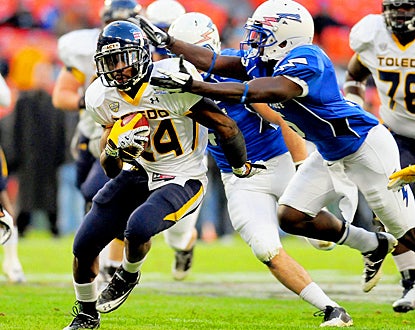 Adonis Thomas gives the Rockets a strong ground presence, rushing for 117 yards and a touchdown. (US Presswire)