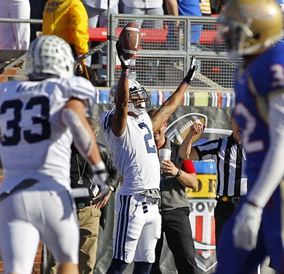 Cody Hoffman celebrates after his third TD catch, with 11 seconds left, gives BYU the go-ahead score.  (US Presswire)