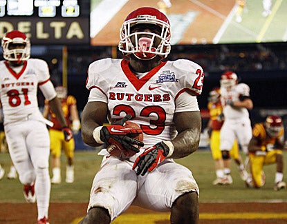 Jawan Jamison, the Pinstripe Bowl MVP, scores one of his two touchdowns against Iowa State. (US Presswire)