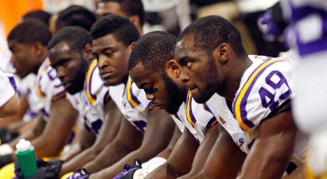 Some LSU players, along with fans and media, are not happy with their coach. (Getty Images)
