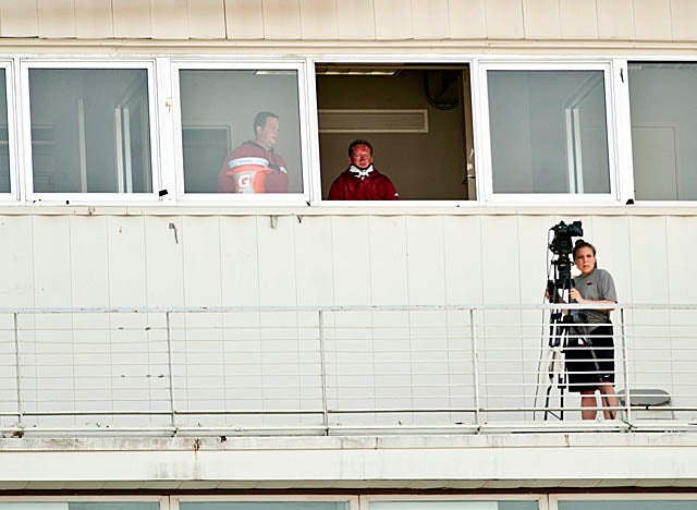 Petrino watched one of his last practices at Arkansas from the press box at Razorback Stadium. (US Presswire)