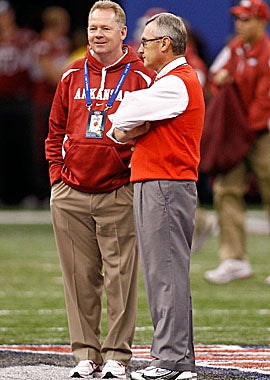 Petrino and Jim Tressel, who met in the 2011 Sugar Bowl, have in common lying to their bosses. (Getty Images)
