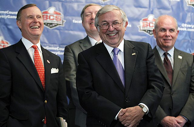 Why are these university presidents smiling? Some of them diminsh their schools' championship chances. (AP)