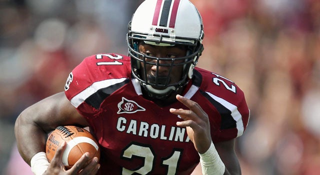 In his last full season, Lattimore rushed for 1,197 yards as a freshman. (Getty Images)