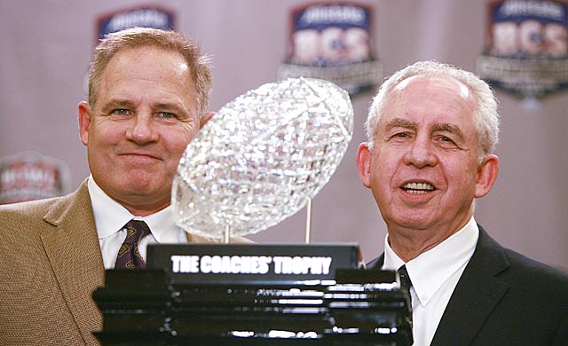 SEC commish Mike Slive (right) probably will be posing with the BCS title trophy again in January. (Getty Images)