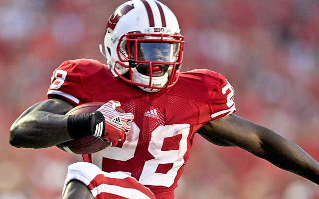 Returning Heisman finalist Montee Ball is hoping to be ready for Wisconsin's opener Saturday. (AP)