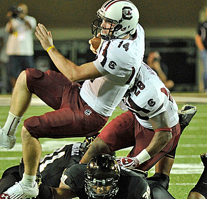South Carolina QB Connor Shaw gives a gutsy performance, coming back from a shoulder injury to lead the winning drive.  (Getty Images)