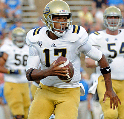 UCLA quarterback Brett Hundley throws for 202 yards while also rushing for a 68-yard touchdown.  (US Presswire)