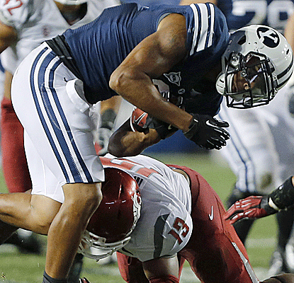 BYU receiver Cody Hoffman contibutes to a Cougar offense that has its way with Mike Leach's Washington St. team.   (Getty Images)