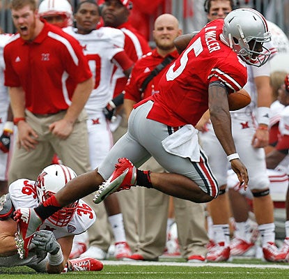 Braxton Miller sets an Ohio State record for quarterbacks with 161 yards rushing, including a 65-yard TD run.  (Getty Images)