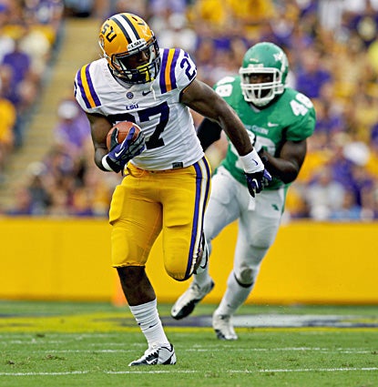 LSU's Kenny Hilliard, who rushes for 141 yards and two TDs, scores on a five-yard run. (US Presswire)
