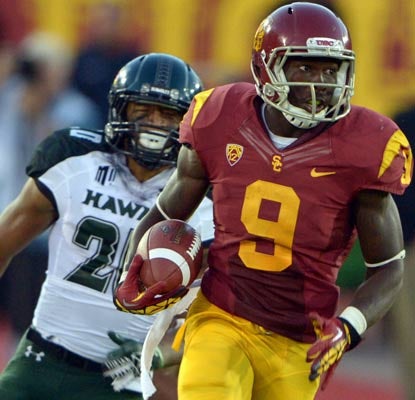 Marqise Lee has a quite a day against Hawaii with 197 yards receiving and two touchdowns, one on a 100-yard kickoff return.  (US Presswire)
