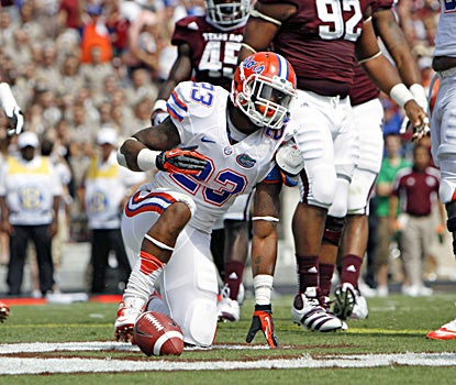 Mike Gillislee takes a knee in the end zone after scoring a touchdown against Texas A&M. (US Presswire)