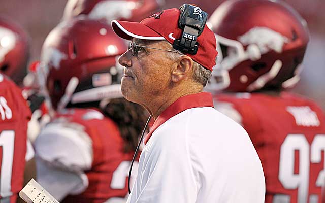 John L. Smith's Razorbacks take the plunge from No. 8 to unranked. (US Presswire)
