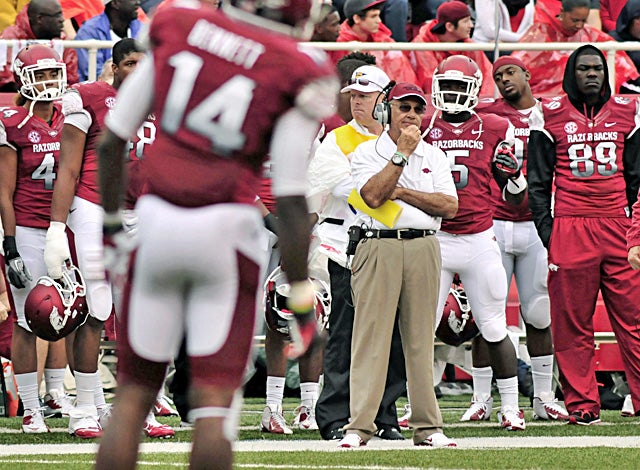 Arkansas coach John L. Smith watches as he endures the worst loss of his career. (AP)