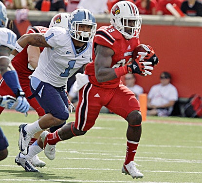 Louisville's Jeremy Wright breaks away for some of his 114 rushing yards against North Carolina.  (AP)