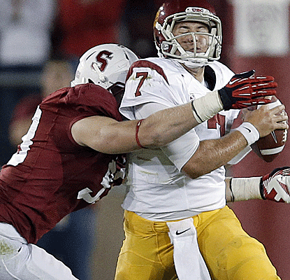 The Stanford defense is stout all night, harassing Matt Barkley into a terrible night by his standards. (AP)