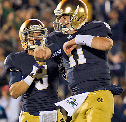 Notre Dame quarterback Tommy Rees and wide receiver Robby Toma celebrate the Irish's lone touchdown.  (US Presswire)