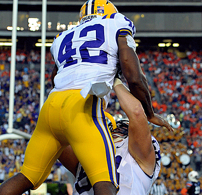 LSU running back Michael Ford celebrates his touchdown against Auburn, which nearly pulls off the upset.  (US Presswire)