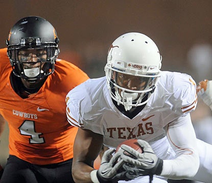 Wideout Mike Davis and the Longhorns hang on for a wild road win against Big 12 foe Oklahoma State. (US Presswire)