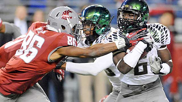 In 18 games as a Duck, Thomas is averaging a TD every 7.65 times he touches the ball. (US Presswire)