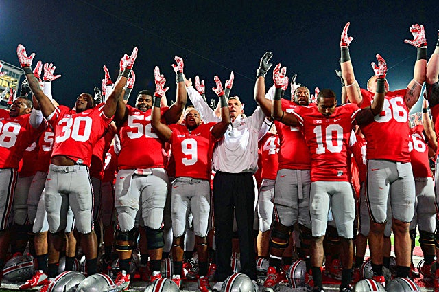 Urban Meyer and his players celebrate following their win over Nebraska at Ohio Stadium. (US Presswire)