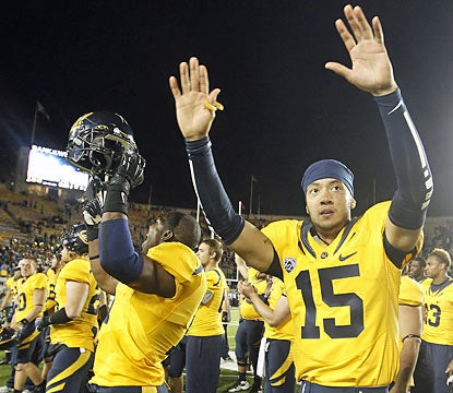 Zach Maynard (15) and the Bears celebrate their upset over 25th-ranked UCLA. (AP)