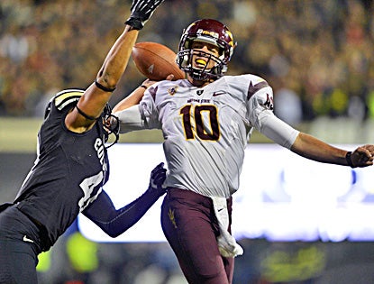 Colorado's Terrel Smith pressures Arizona State's Taylor Kelly during the Sun Devils' 51-17 win.  (US Presswire)