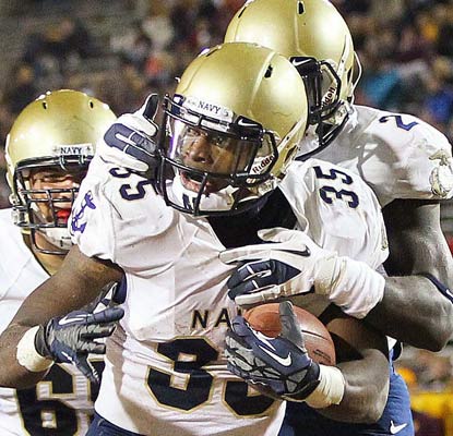 Navy's Prentice Christian celebrates a 2-yard touchdown run for the victorious Midshipmen.  (US Presswire)