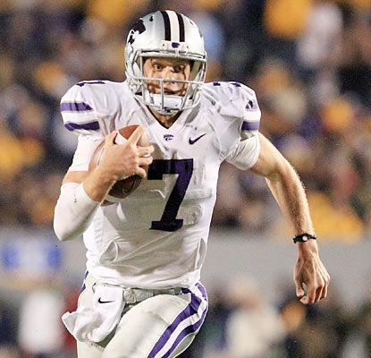 Collin Klein throws for a career-high 323 yards and three TDs and also adds four more scores on the ground. (AP)