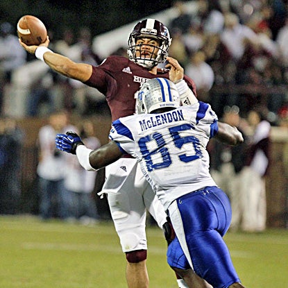 MSU quarterback Tyler Russell completes 17 of 21 passes for 191 yards and three touchdowns. (AP)