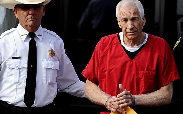 Sandusky, here leaving court after his sentencing hearing, was transferred to state prison. (Getty Images)