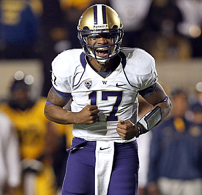 Keith Price and the Washington Huskies are able to overcome four turnovers to get a win against Cal.  (Getty Images)