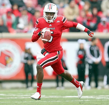 Teddy Bridgewater doesn't rely on his legs against Temple. Instead, he throws a career-high five touchdowns in the win. (Getty Images)