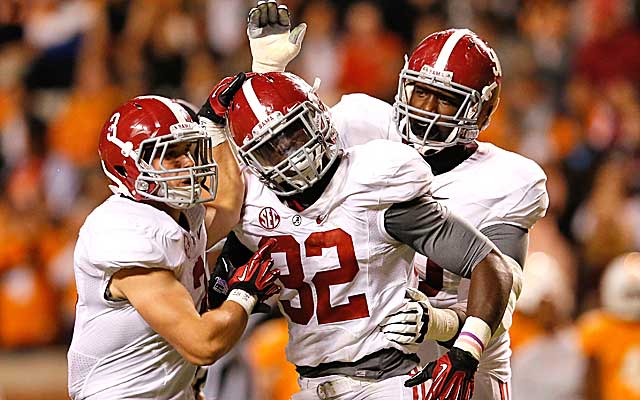Mosley wears No. 32 in honor of childhood pal Robert Hardy, who died six years ago. (Getty Images)