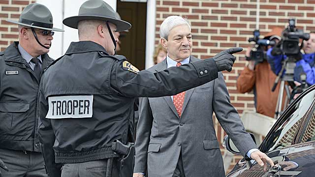 Spanier leaves Harrisburg District Judge William Wenner's office Wednesday (AP)