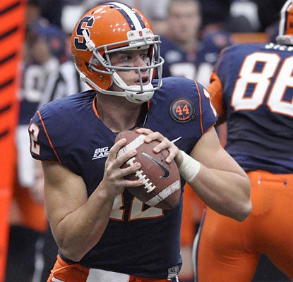 Ryan Nassib throws for 246 yards, surpassing Donovan McNabb for No. 2 on Syracuse's all-time list.  (AP)