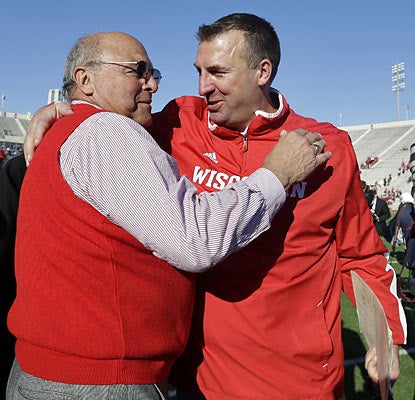 Wisconsin coach Bret Bielema (right) celebrates as his team earns a trip back to the Big Ten title game. (AP)